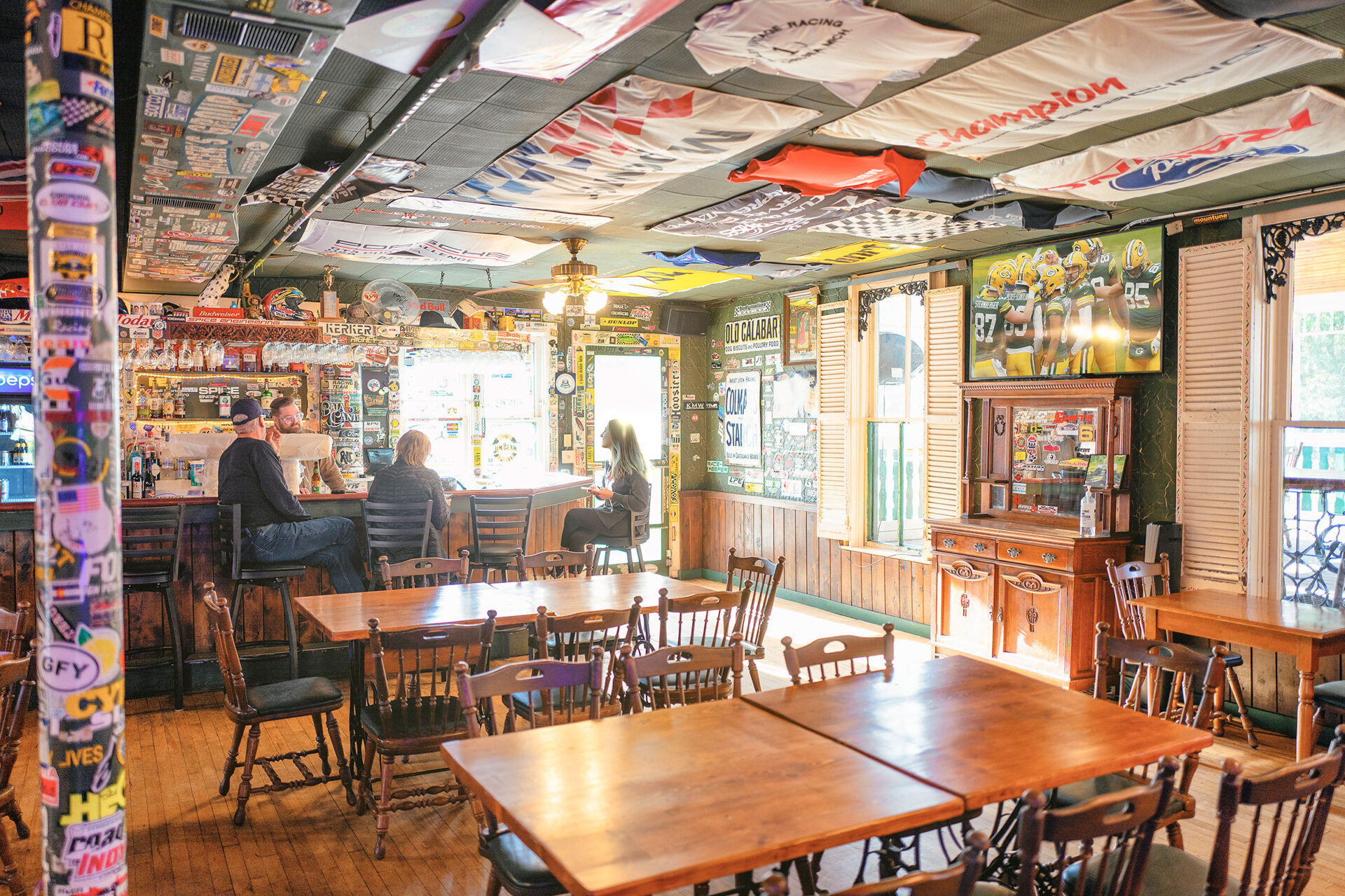 people enjoying the food and atmosphere of the Stop-Inn Tavern at Siebkens Resort